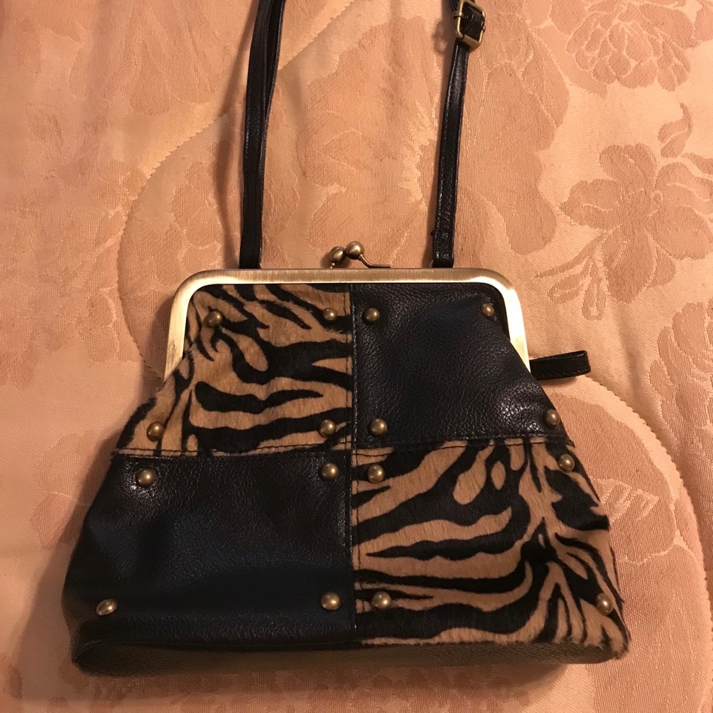 Animal print accent crossbody. 9 X 6. Like new.